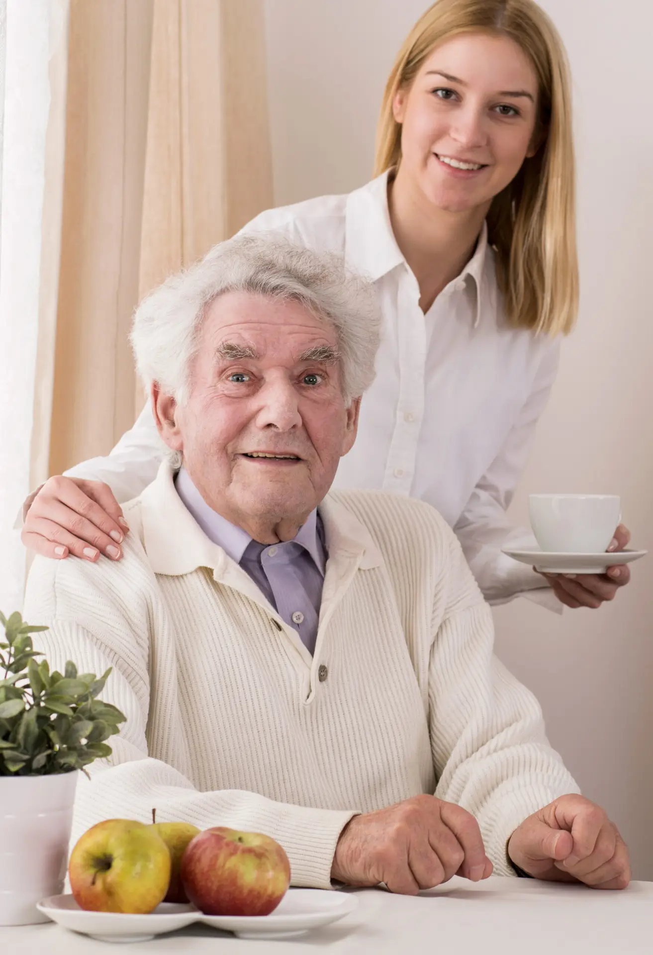 care assistant serving tea to her old patient 2025 10 10 09 35 31 utc